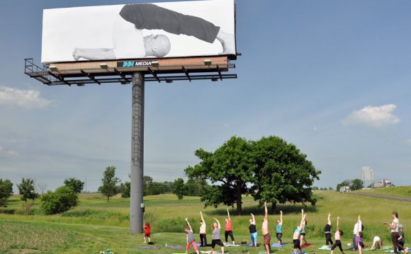 Yoga Under the Billboard event