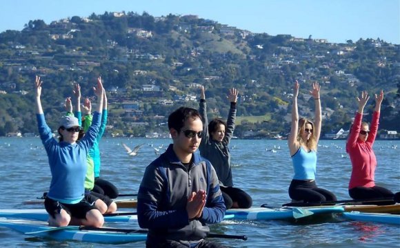 Stand up paddle yoga